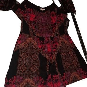 Kendall & Kylie small red & black floral cold shoulder romper ties at shoulder